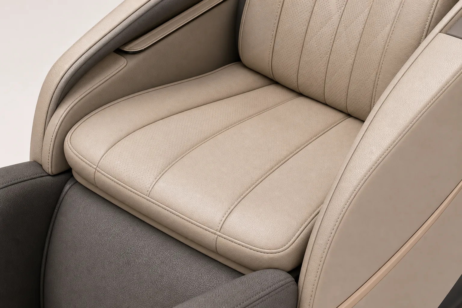 Massage chair seat cushion load zone and seam-layout concept