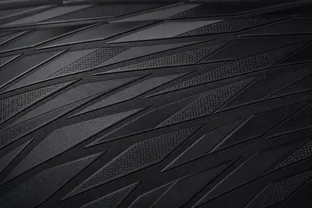 Directional prism artificial leather texture